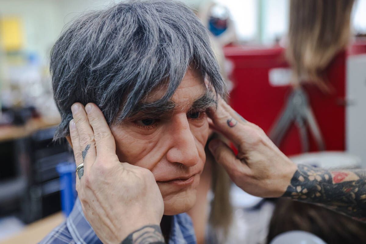 Founder Matt McMullen places a face on a robot at the workshop for Realbotix, a company that makes life-like AI driven robots, in Las Vegas, on Jan. 17.  (Rachel Aston/Las Vegas Review-Journal)