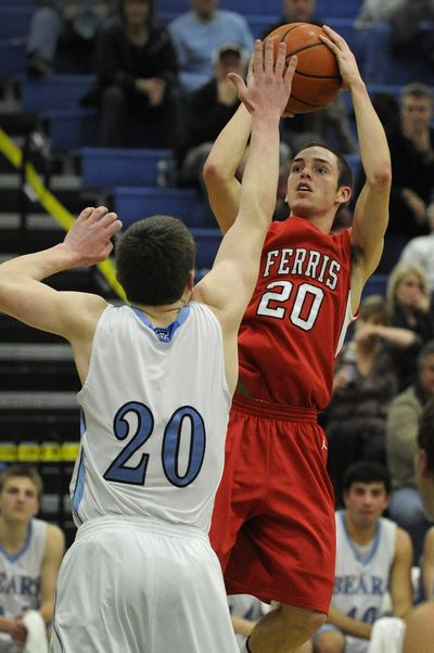 Central Valley’s Austin Rehkow tries to block a shot by Ferris’ Chris Wilson. (Colin Mulvany)