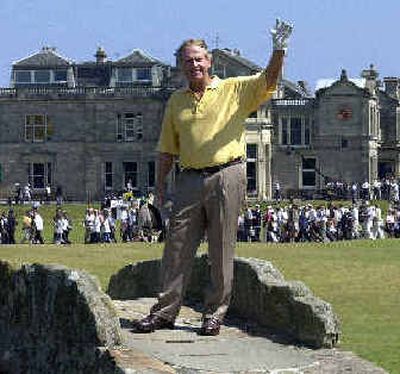 Jack Nicklaus waves to spectators from the Swilken Bridge during the 2000 British Open on the Old Course at St. Andrews, Scotland.
(Associated Press / The Spokesman-Review)