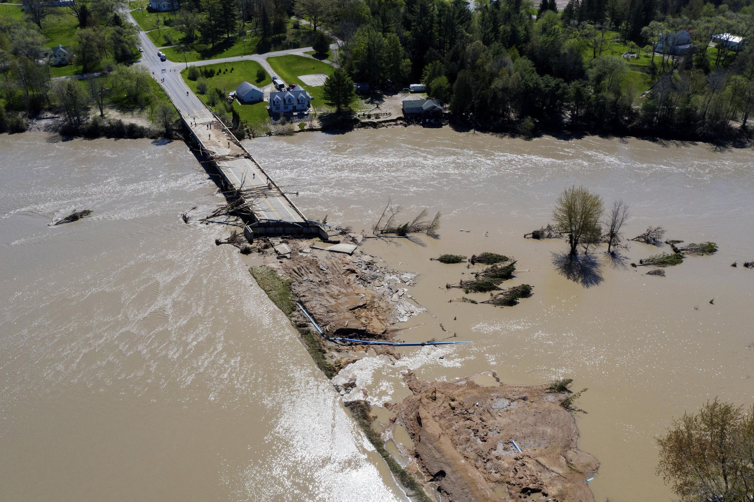 Amid Cleanup Flooding In Michigan Prompts More Evacuations The