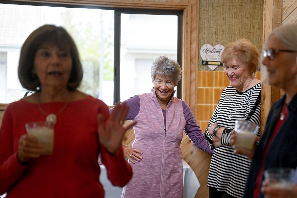 Retired Roosevelt Elementary School teachers from left Ginny McCoy, Debi Maher, Jan Erickson, Mary Shields and Char Russell, share stories before lunch in Spokane on March 18. They have known each other for 40-plus years and meet monthly for lunch.  (Kathy Plonka/The Spokesman-Review)