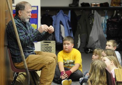 Don Conley spins a story on Friday to the second- and third-grade class his son teaches at Skyview Elementary School. John Conley often invites his father to tell stories. (Dan Pelle / The Spokesman-Review)