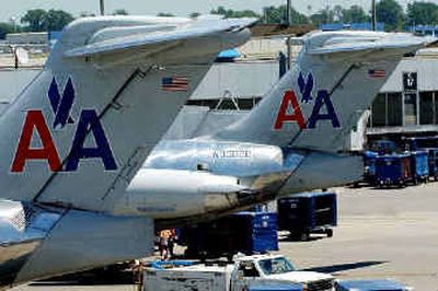 
American Airlines jets sit on the tarmac at Lambert International Airport in St. Louis. 
 (Associated Press / The Spokesman-Review)