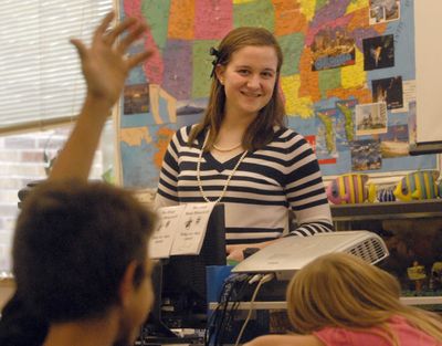Christy Finley teaches the “Jours de la Semaine” (days of the week) in her mother’s Trent Elementary fourth-grade class  Oct. 16.  (J. BART RAYNIAK / The Spokesman-Review)
