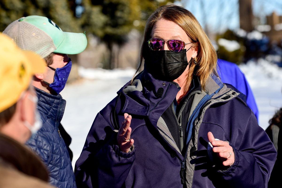 Federal Emergency Management Agency Administrator Deanne Criswell, right, talks with officials during a tour of the Marshall Fire in Louisville, Colo., on Sunday, Jan. 2, 2022. Investigators are still trying to determine what sparked a massive fire in a suburban area near Denver that burned neighborhoods to the ground and destroyed nearly 1,000 homes and other buildings.  (Matthew Jonas)