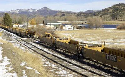 
Rail cars sit on an unused line near the community of Craig, Mont., on Feb. 15. BNSF spokesman Gus Melonas says they have been parked  because freight demand has slowed. Associated Press
 (Associated Press / The Spokesman-Review)