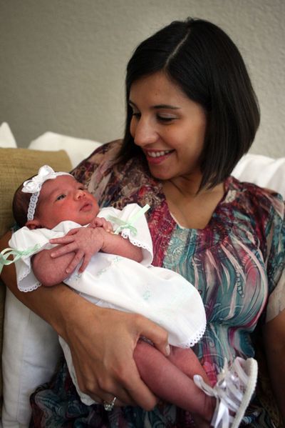 Jennifer Garcia and her 1-week-old daughter, Natalia Carmen Garcia, sit at their home in Miramar, Fla., May 26.McClatchy (McClatchy / The Spokesman-Review)