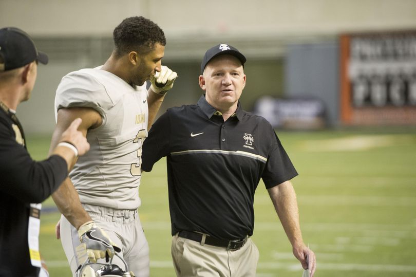 Idaho tight end Deon Watson (3) gets a pat on the back from head coach Paul Patrino as the clock runs down against Montana State during a college football game on Thursday, Sep 1, 2016, outside the Kibbie Dome in Moscow, ID. Idaho won the game 20-17. (Tyler Tjomsland / The Spokesman-Review)