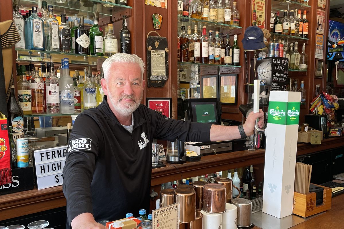 Brian Coyle, owner of Danny Coyle’s Irish sports pub, holds down the fort Friday in San Francisco. The bar has become a place for Seahawks fans to gather and watch games in rival San Francisco 49ers country.  (Garrett Cabeza / The Spokesman-Review)