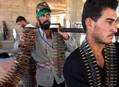 
Iraqi soldiers guard the Imam Ali mosque in Najaf on Aug. 15 during clashes between Shiite militants and a combined U.S.-Iraqi force.
 (File/Associated Press / The Spokesman-Review)