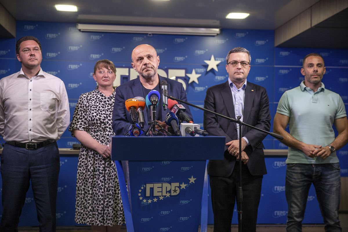 Former deputy prime minister Tomislav Donchev, center, and GERB political party officials attend a news conference in capital Sofia, Bulgaria on Sunday, July 11, 2021. Voter apathy dominated Bulgaria