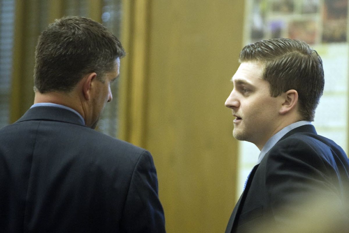 Killer Justin W. Crenshaw, right, talks with his attorney, Chris Bugbee at the Spokane County Courthouse Tuesday, July 27, 2010. Crenshaw, 22, was found guilty of two aggravated first-degree murder charges Tuesday for the Feb. 28, 2008, deaths of Tanner Pehl and Sarah Clark. (Jesse Tinsley / The Spokesman-Review)