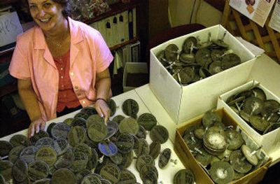 
Kaye Turner, executive director of Friends of the Centennial Trail, was shocked to discover 40 medallions were stolen along the centennial trail. 
 (Jed Conklin / The Spokesman-Review)