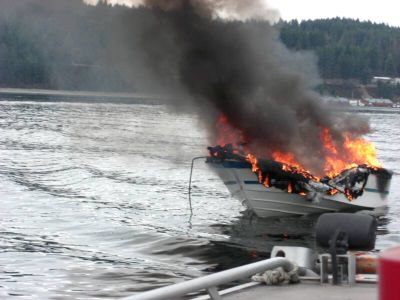 A boat burns on Lake Pend Oreille after a portable heater ignited a fire. Timberlake Fire Protection District (Timberlake Fire Protection District / The Spokesman-Review)