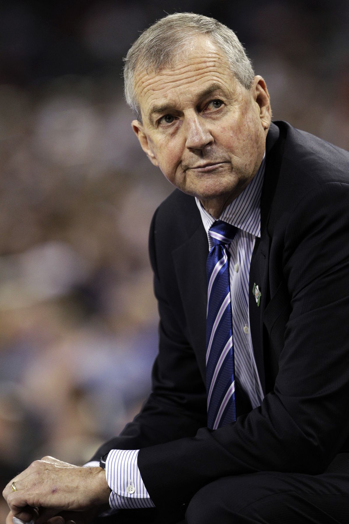 FILE - In this April 4, 2011, file photo, Connecticut head coach Jim Calhoun sits on the sideline during the second half of the men