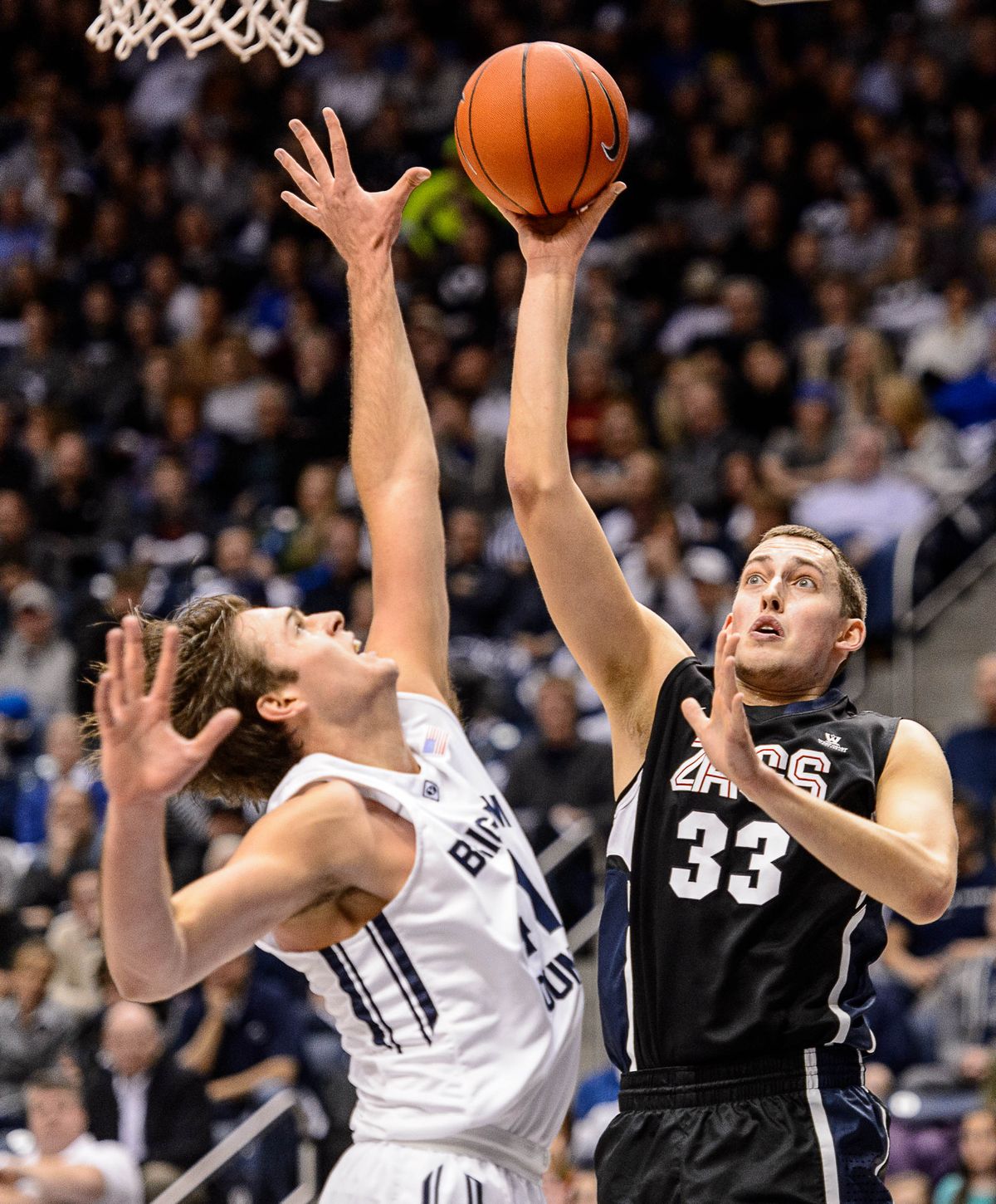 GU’s Kyle Wiltjer shoots over BYU’s Luke Worthington. (Associated Press)