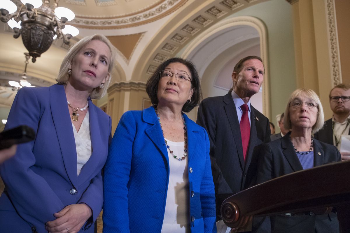 From left, Sen. Kirsten Gillibrand, D-N.Y., Sen. Mazie Hirono, D-Hawaii, Sen. Richard Blumenthal, D-Conn., and Sen. Patty Murray, D-Wash., assistant Senate minority leader, speak with reporters in this September 2018 photo. Hirono has long been championing legislation restoring Medicaid coverage to residents of the Asian and Pacific islands, a measure that was passed as part of a COVID-19 relief bill awaiting President Donald Trump