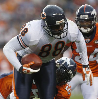 Bears tight end Desmond Clark (88) is tackled by Broncos linebacker D.J. Williams during Chicago’s preseason victory. (Associated Press / The Spokesman-Review)