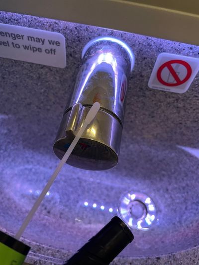 The lavatory faucet registered as the germiest spot on the plane.  (Andrea Sachs/Washington Post)