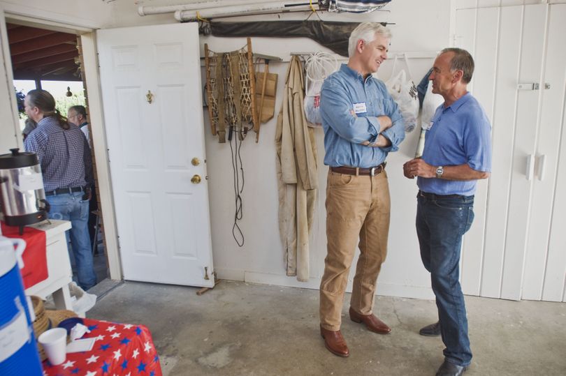  Keith Allred, left, talks with 1st District Rep. Walt Minnick during a picnic for Canyon County Democrats  July 10 in Nampa, Idaho.  (Associated Press)