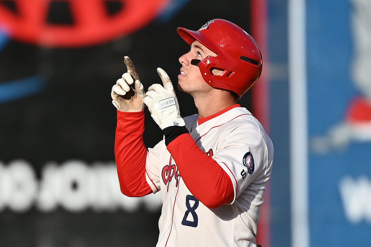 Spokane Indians catcher Drew Romo celebrates a double against the Vancouver Canadians during Saturday’s Northwest League baseball game at Avista Stadium. Spokane won 10-2.  (James Snook)