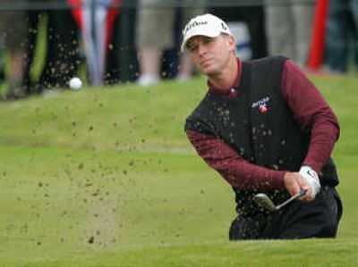
Steve Stricker plays from a bunker on the 18th at the British Open.Associated Press
 (Associated Press / The Spokesman-Review)