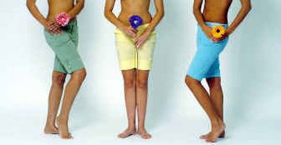 
 Three models spring into fashion with Bermuda shorts. From left, Old Navy brand ultra low waist Bermudas in green and yellow, $24.50. At right is a pair from American Eagle Outfitters, $34.50. 
 (Knight Ridder / The Spokesman-Review)