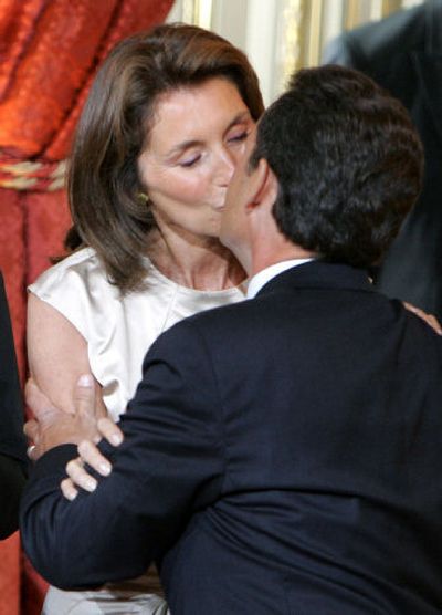 
French President Nicolas Sarkozy kisses his wife, Cecilia, in Paris in May. The couple is reportedly splitting up. Associated Press
 (Associated Press / The Spokesman-Review)