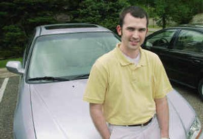 
Jacob Sevlie of Bloomington, Minn., was part of a pilot project whereby Progressive Insurance placed black boxes beneath the dash boards of selected cars of Progressive Corp. customers.
 (Associated Press / The Spokesman-Review)