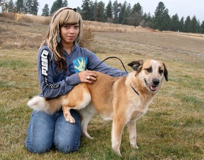 Ericka Evans is a Pawsitive Works volunteer. The dog with Ericka is Toven.