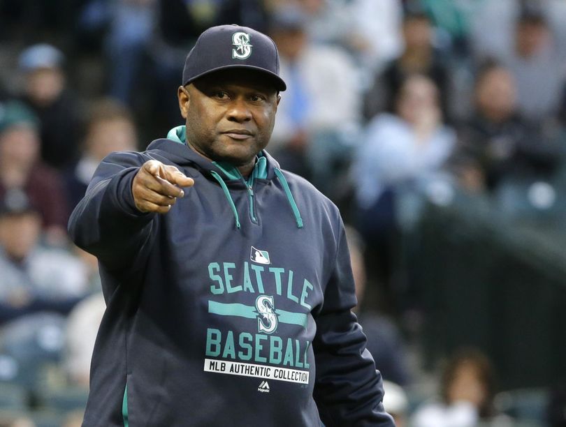 FILE - In this Oct. 3, 2015, file photo, Seattle Mariners manager Lloyd McClendon points towards first base while questioning an umpire's call in the first inning of a baseball game against the Oakland Athletics in Seattle. The Mariners have fired manager Lloyd McClendon after two seasons,  Friday, Oct. 9, 2015, less than a week after the Mariners concluded a disappointing 76-86 season.(AP Photo/Ted S. Warren, File) (Ted S. Warren / AP)