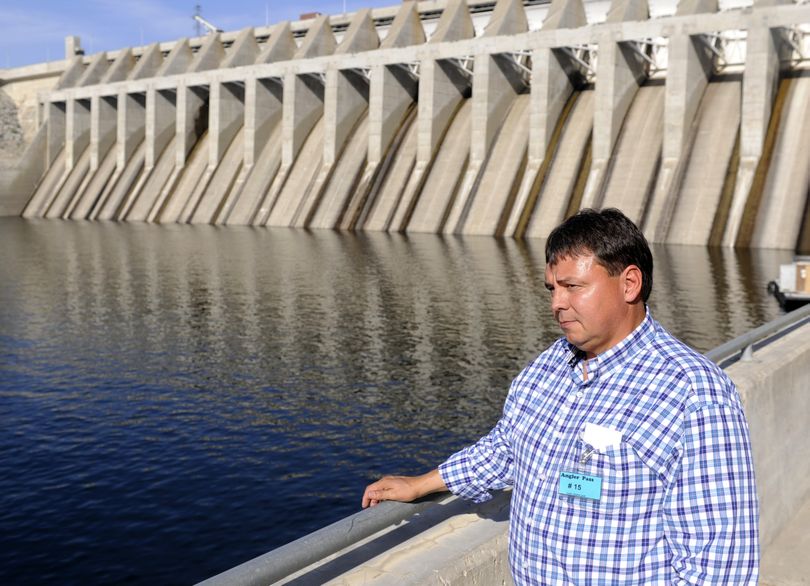 Joe Peone, former fisheries manager for the Confederated Tribes of the Colville Reservation, stands at Chief Joseph Dam on the Columbia River. The tribal government was a key advocate for a hatchery below the dam to provide more fish for  the tribe, but which will benefit other anglers as well. (Jesse Tinsley / The Spokesman-Review)