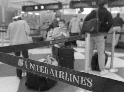 
At the end of the year, United Airlines will will delete all the miles of frequent-flier club members who haven't earned or redeemed miles in 18 months, down from the current 36 months. 
 (Associated Press / The Spokesman-Review)