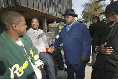 
Gangster rapper Beanie Sigel, center, greets supporters gathered outside the federal courthouse in Philadelphia in 2004. Sigel was sentenced to one year in federal prison  on a gun-possession charge. 
 (Associated Press / The Spokesman-Review)