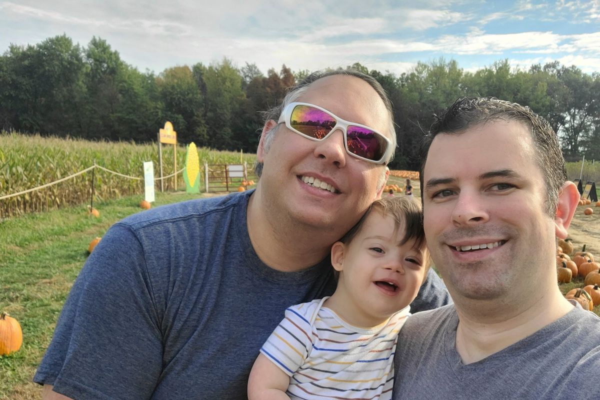 Frederick Brushaber, left, his husband Mark Grice pose with their baby Freddie on Oct. 15 in Cincinnati, Ohio. The trio will spend Thanksgiving with family in Knoxville, Tenn. (Mark Grice)