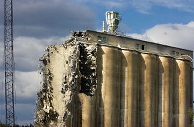 
 A Louisiana company is demolishing the huge silos. 
 (Kathryn Stevens / The Spokesman-Review)