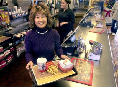 Kyong Kapalczynski stands in the McDonald's on Brooks Street in Missoula,  where she started making biscuits a decade ago and which she now owns, along with three others. 
 (Associated Press / The Spokesman-Review)