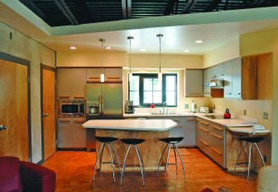 
In the four-unit condo development built by William and Diane Hellar on Schweitzer Mountain, space in the kitchen is at a premium, so built-in appliances and storage are designed to make maximum use of the space. The microwave is built into the cupboard at left. 
 (The Spokesman-Review)