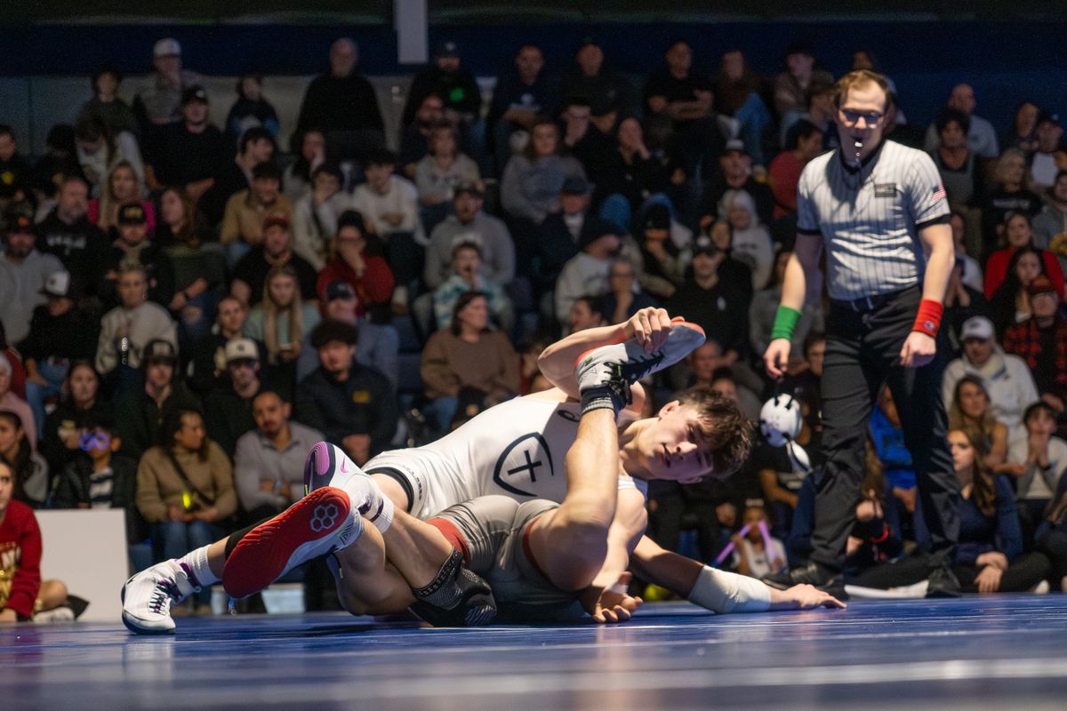 Gonzaga Prep freshman Ryder Owen, facing, earns a takedown against University’s Waylnn Hardwick during a Greater Spokane League duel on Thursday at Gonzaga Prep. (Madison McCord/For The Spokesman-Review)