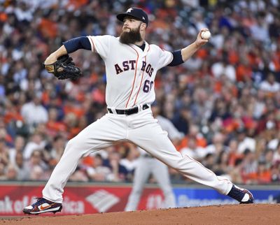 Houston Astros starting pitcher Dallas Keuchel delivers in the second inning of a baseball game against the Seattle Mariners, Monday, April 3, 2017, in Houston. (Eric Christian Smith / Associated Press)