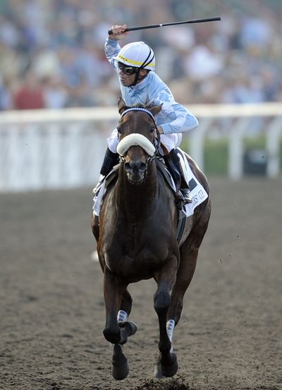 Jockey Garrett Gomez, on Life is Sweet, reacts as he crosses the finish line to win the Breeders’ Cup Ladies’ Classic.  (Associated Press / The Spokesman-Review)