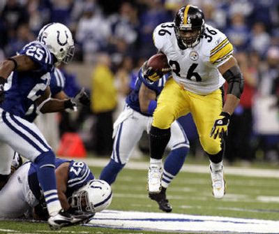 
Jerome Bettis, carrying the ball against the Colts on Jan. 15, first was used as a running back his junior year of high school. 
 (Associated Press / The Spokesman-Review)