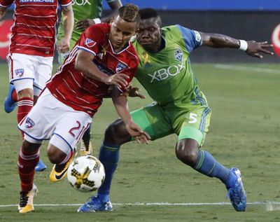 In this Sept. 16, 2017 file photo, Seattle Sounders defender Nouhou, rear, defends during the first half of an MLS soccer match in Frisco, Texas. (Stewart F. House / Dallas Morning News via AP)