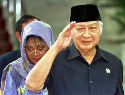 
Indonesian President Suharto salutes after announcing his resignation in a nationwide television address in Jakarta, Indonesia, on May 21, 1998. Associated Press
 (FILE Associated Press / The Spokesman-Review)