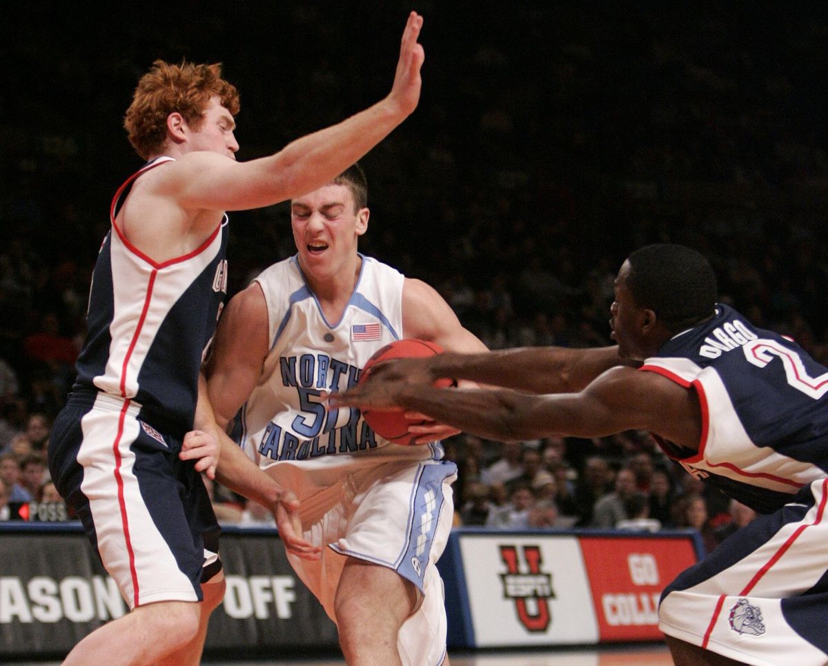 North Carolina’s Tyler Hansbrough, center, is stripped of the ball by Gonzaga’s Jeremy Pargo, right, and David Pendergraft in the second half during the semifinals of the NIT  Season Tip-Off on Nov. 22, 2006, at Madison Square Garden in New York. Gonzaga won 82-74. (JULIE JACOBSON / AP)