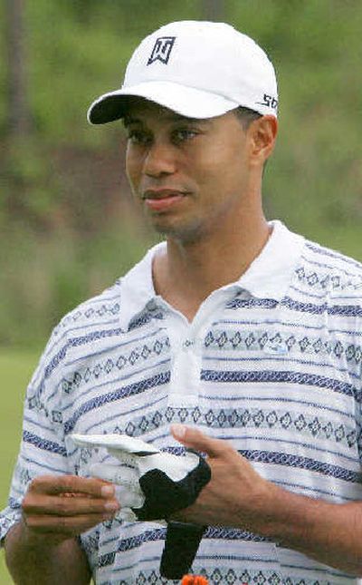 
Tiger Woods talks to the crowd during a clinic in Arkansas. 
 (Associated Press / The Spokesman-Review)