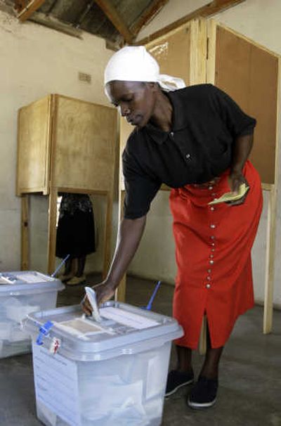 
A  woman casts her vote Saturday in Harare, Zimbabwe. Associated Press
 (Associated Press / The Spokesman-Review)