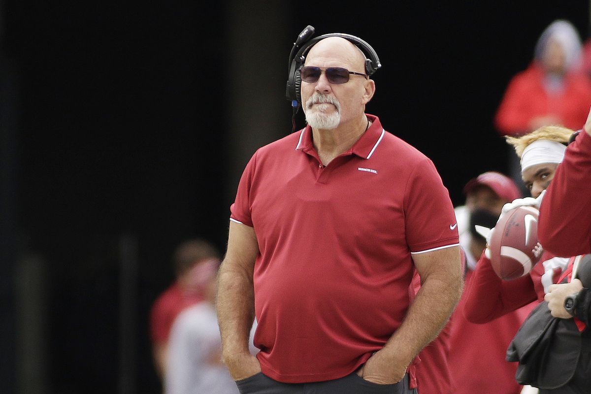 Washington State offensive line coach Dennis McKnight watches the second half of a nonconference game against BYU on Saturday, Oct. 23 in Pullman, Wash.  (Associated Press)