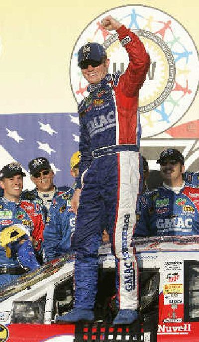 
Brian Vickers  in victory lane after a controversial win. 
 (Associated Press / The Spokesman-Review)