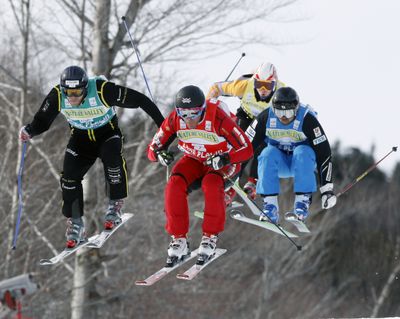 Skicross, which tends to attract veteran skiers whose downhill days are waning, challenges its competitors with banked turns, blind jumps and little room to maneuver among rivals.  (File Associated Press)